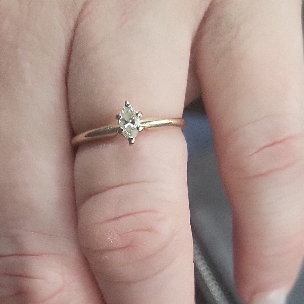 Gold Solitaire Ring with Sparkling Gemstone